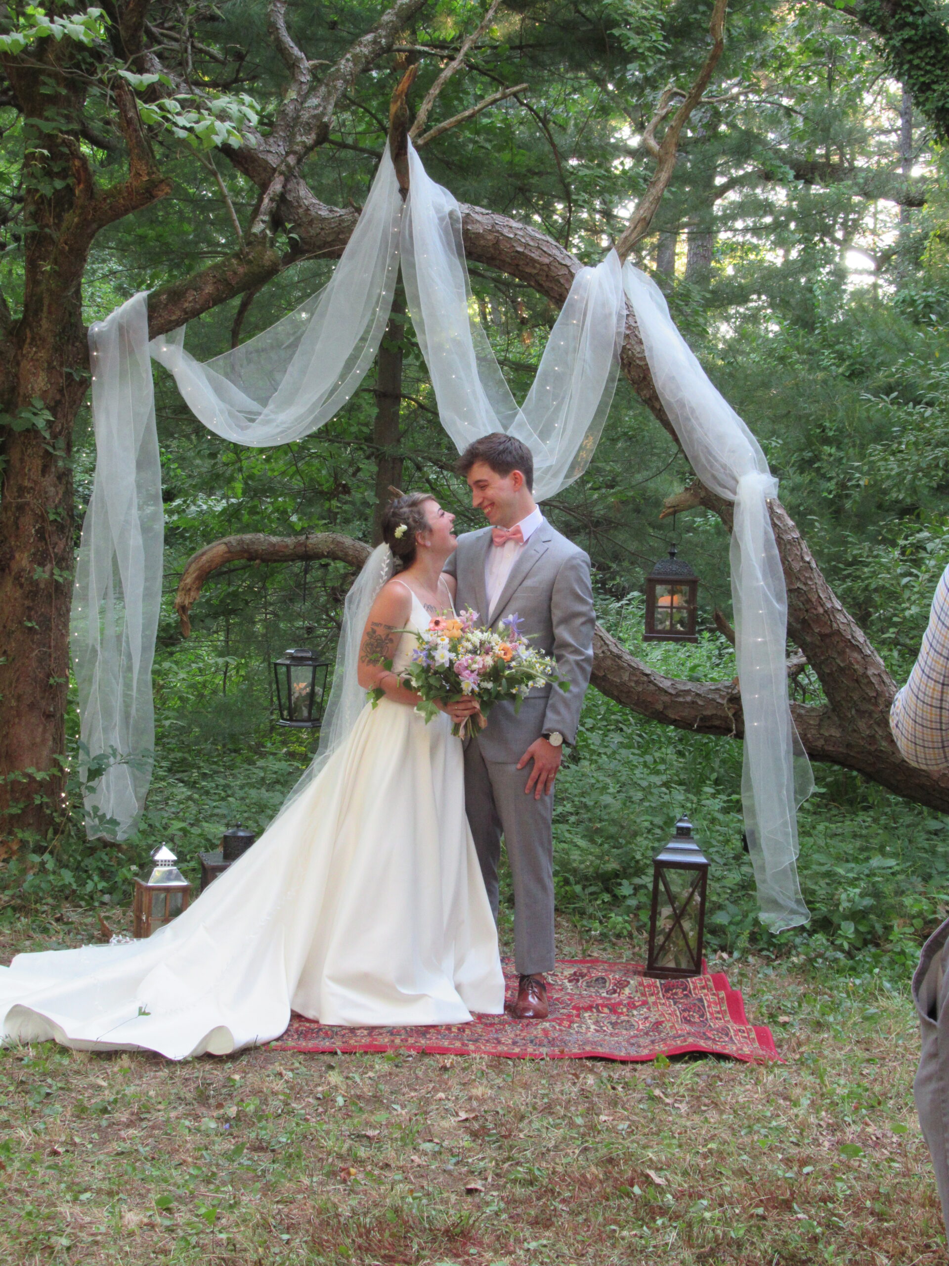 A couple having an outdoor wedding